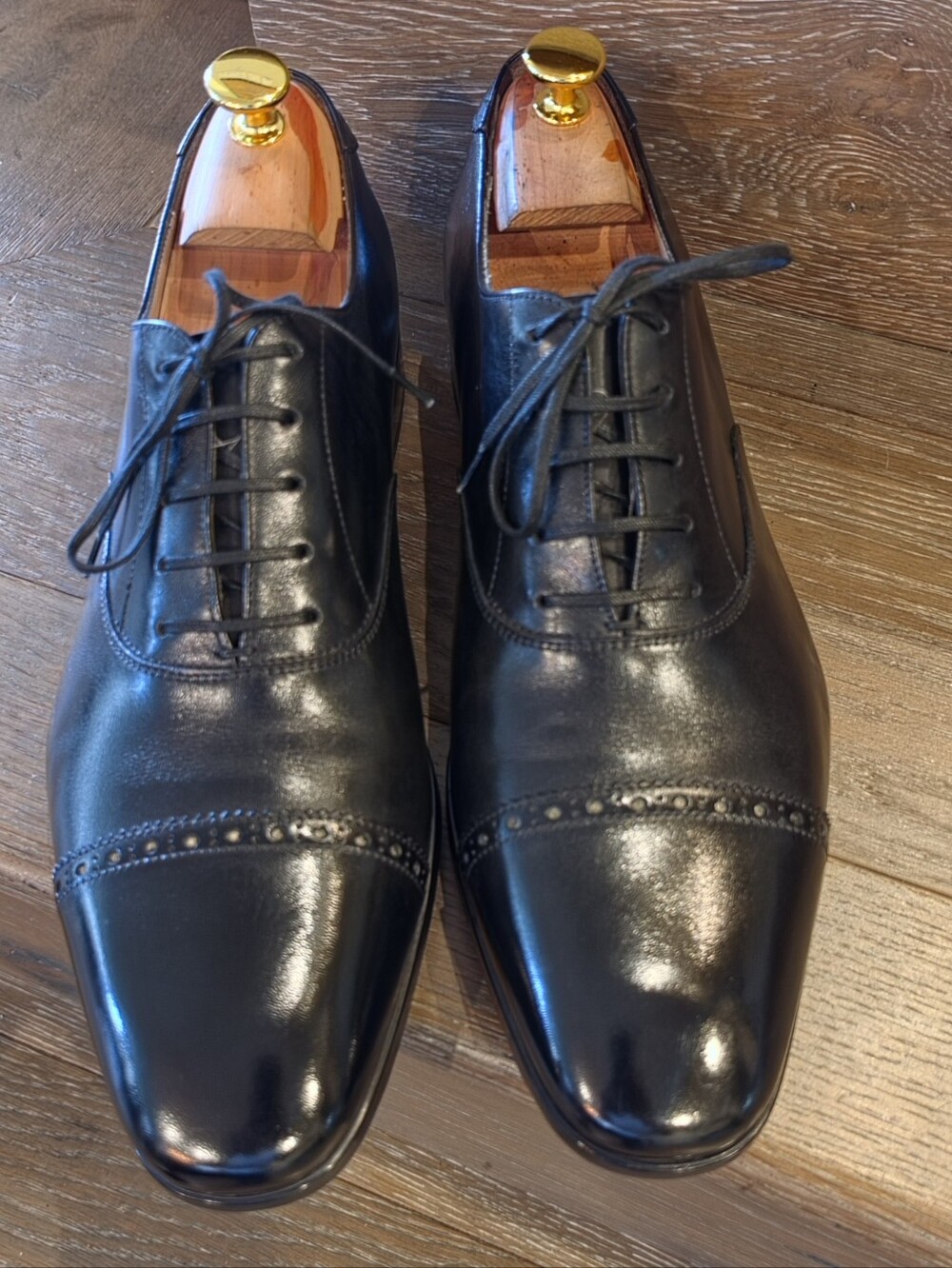 Salvatore Ferragamo Black Leather Cap-Toe Derbys with Brogue Detail